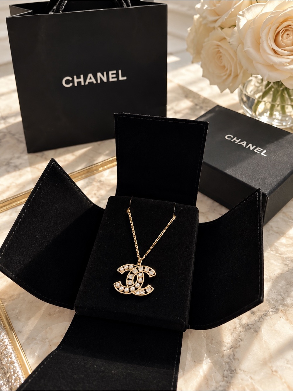 CHANEL Gold Pearl and Crystal CC Logo Necklace